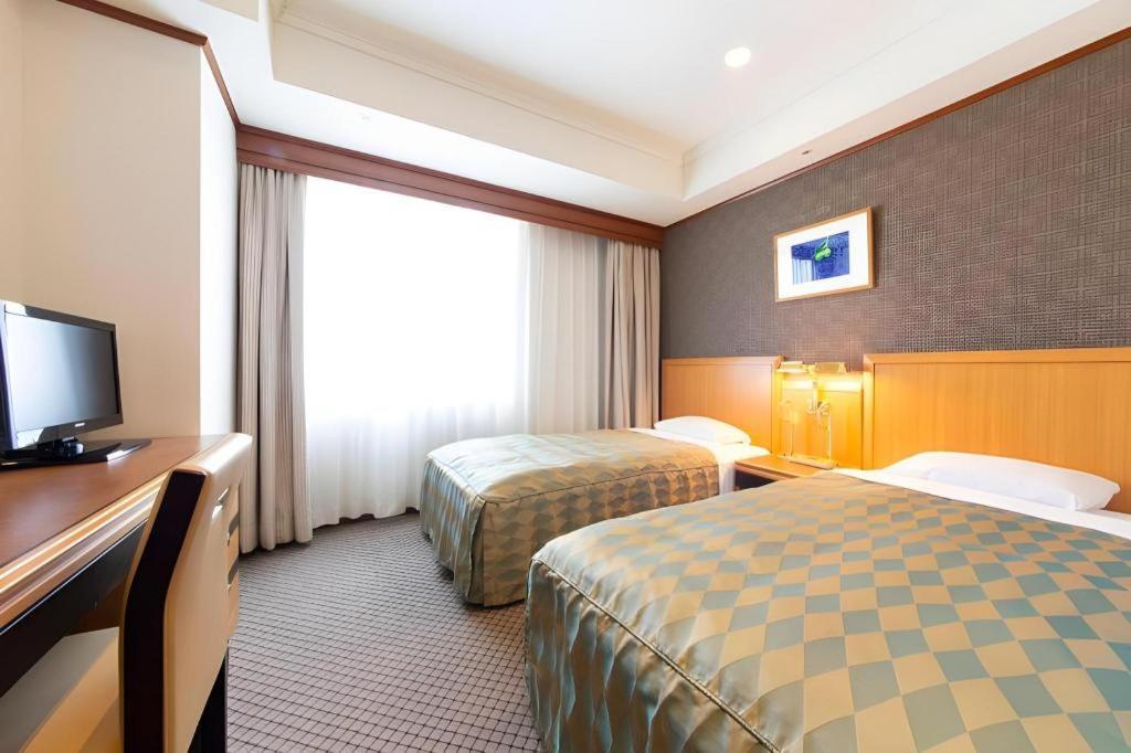 Hotel Le Port Kojimachi Токио Экстерьер фото